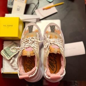 Versace chain reactions